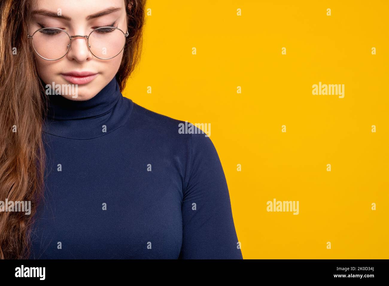 smart woman portrait advertising background orange Stock Photo