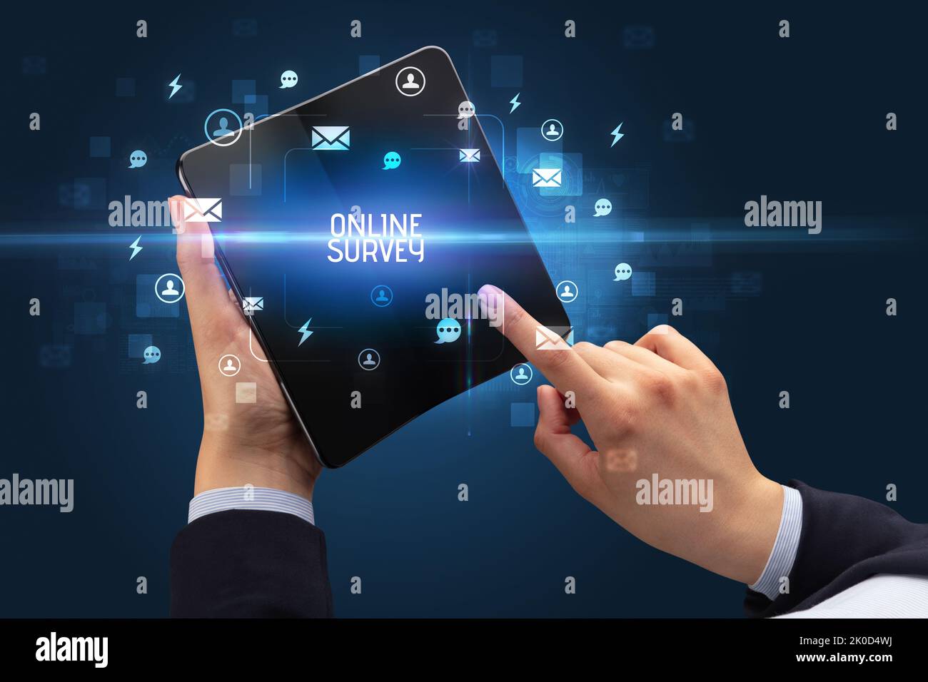 Businessman holding a foldable smartphone, social media concept Stock Photo