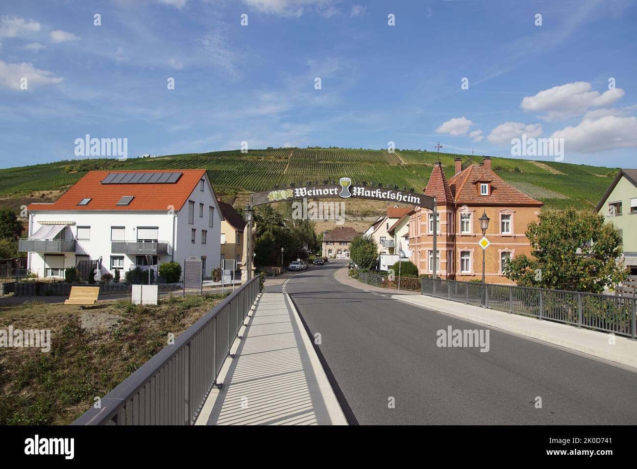 On the bridge over the river Tauber to the vineyards on the hills. Markelsheim, a district of Bad Mergentheim in the Main-Tauber district. Germany, Stock Photo
