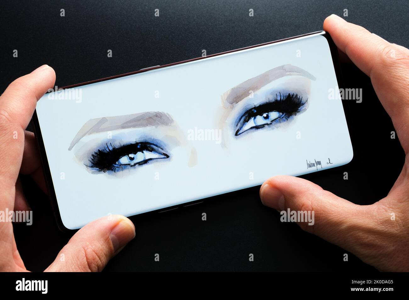 NFT called Melania's Vision seen on the smartphone screen. Marc Antoine Coulon’s watercolor pictures Melania Trump’s blue eyes. Stafford, UK, Septembe Stock Photo
