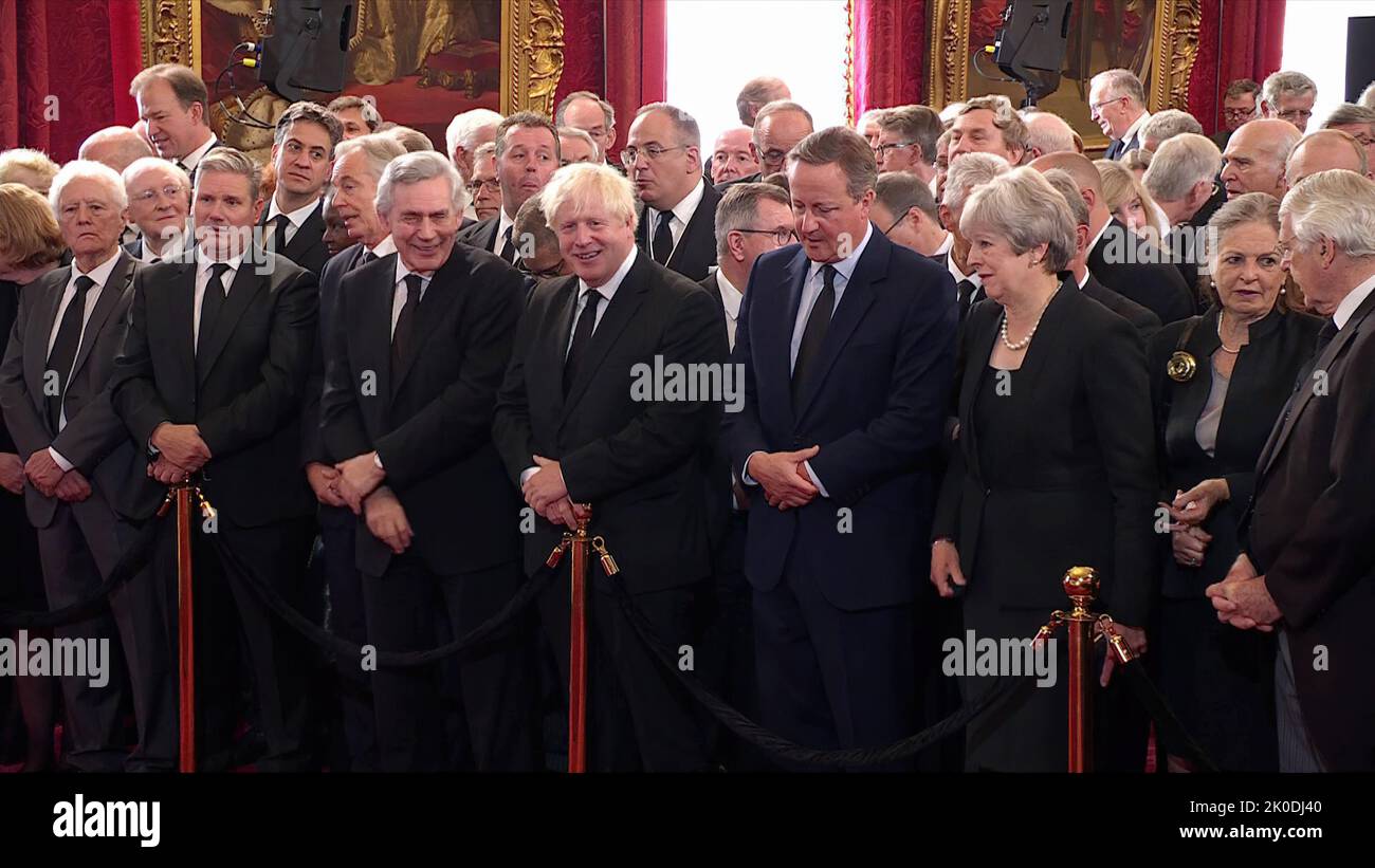 Pic shows: Prince William and Queen Camilla with Liz Truss and Penny Mordaunt sign the proclamation  as Six former Prime Ministers in a row look on  T Stock Photo