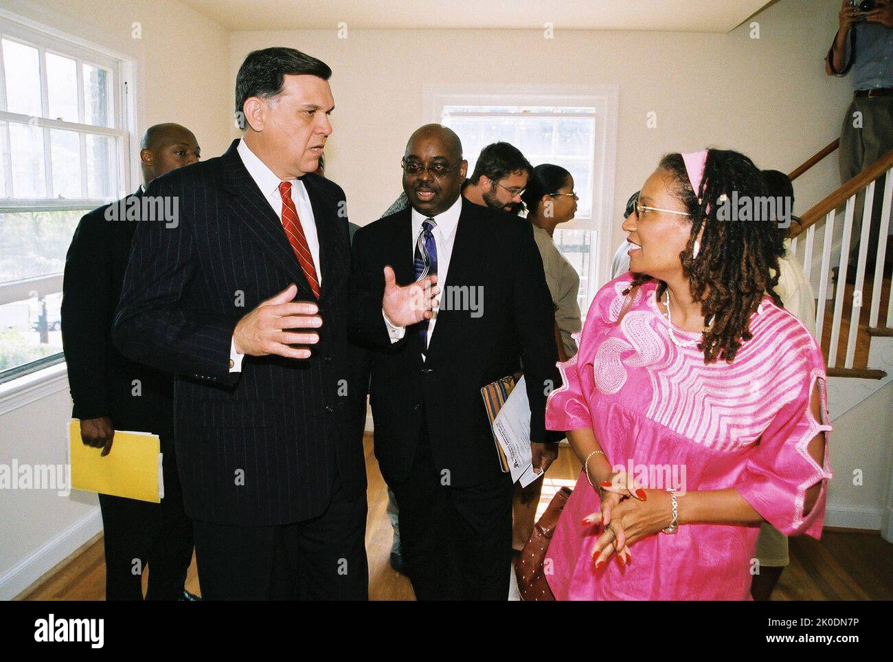 Secretary Mel Martinez at HUD-Church Association for Community Services Press Event. Secretary Mel Martinez at HUD-Church Association for Community Services Press Event Subject, Secretary Mel Martinez at press event and tour marking a housing redevelopment partnership between HUD and the Church Association for Community Services (CACS), a faith-based non-profit organization representing over 40 churches in Washington, D.C. Under the agreement, HUD is selling 300 Federal Housing Administration-foreclosed, vacant properties--lying within five D.C. areas designated as 'revitalization zones'--to C Stock Photo