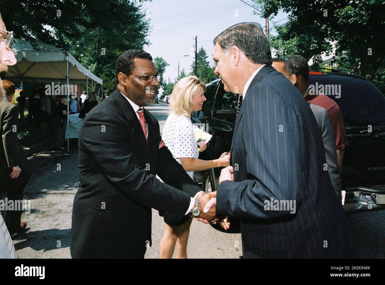 Secretary Mel Martinez at HUD-Church Association for Community Services Press Event. Secretary Mel Martinez at HUD-Church Association for Community Services Press Event Subject, Secretary Mel Martinez at press event and tour marking a housing redevelopment partnership between HUD and the Church Association for Community Services (CACS), a faith-based non-profit organization representing over 40 churches in Washington, D.C. Under the agreement, HUD is selling 300 Federal Housing Administration-foreclosed, vacant properties--lying within five D.C. areas designated as 'revitalization zones'--to C Stock Photo