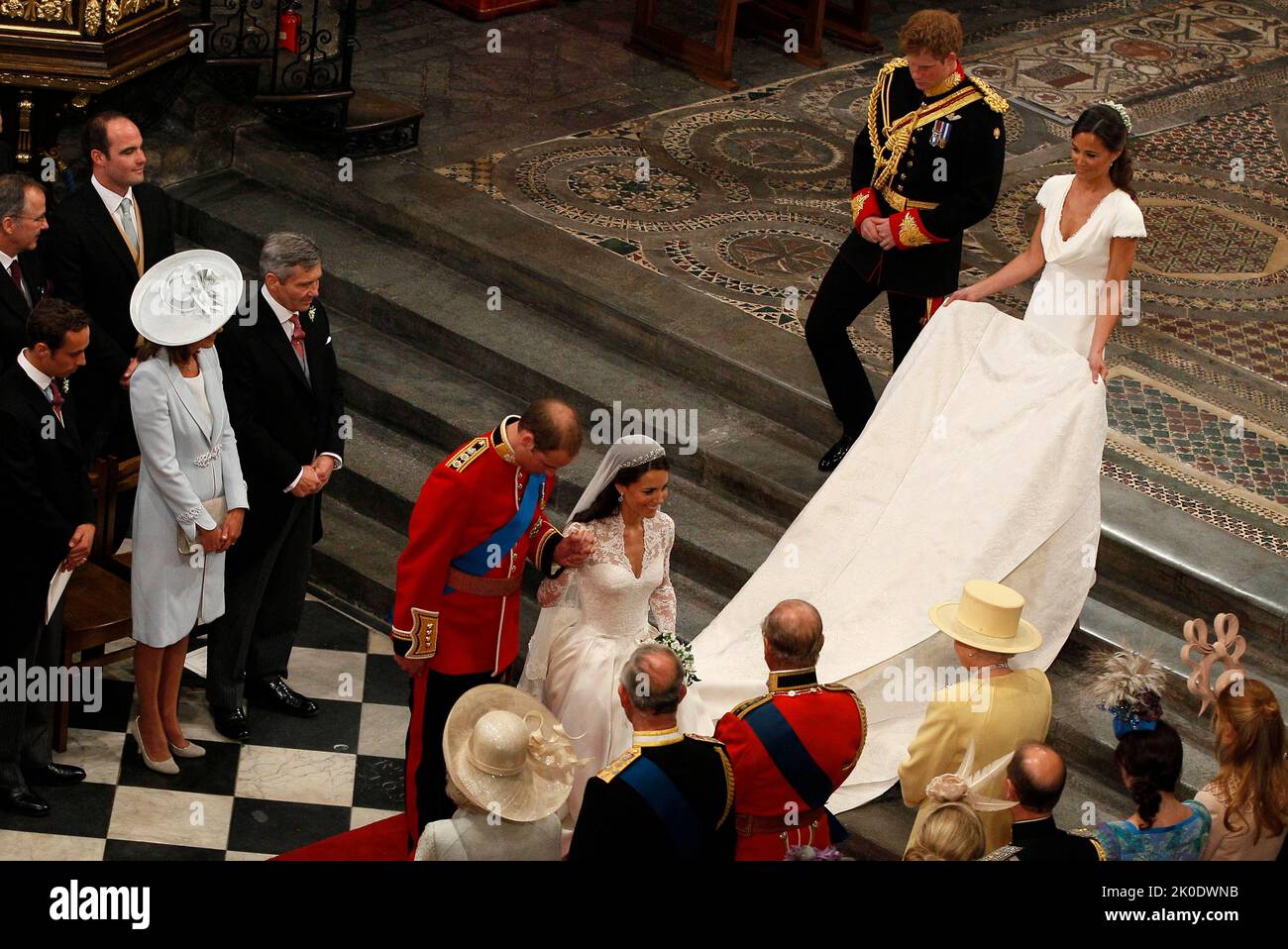 File photo dated 29/04/11 of Prince William and his wife Kate, Duchess of Cambridge, curtsies in front of Queen Elizabeth II,as they leave Westminster Abbey after the wedding service at the Royal Wedding in London as the Queen's funeral venue is where she was married and crowned. The monarch had close connections to the church - a focal point during times of national celebration and sadness. The Queen was married and crowned at Westminster Abbey. Now the bells of the 'House of Kings' - half muffled in mourning - will ring out at her funeral. It will be the first time in over 260 years a sovere Stock Photo