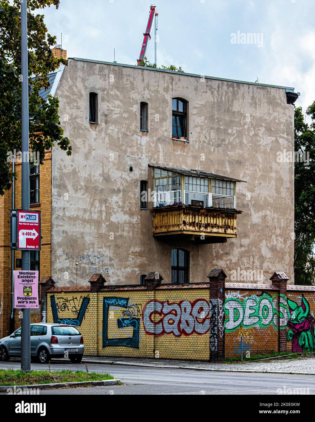 Wall with urban art & balcony on Firewall of building, Ollenhauerstrasse, Reinickendorf, Berlin, Germany Stock Photo