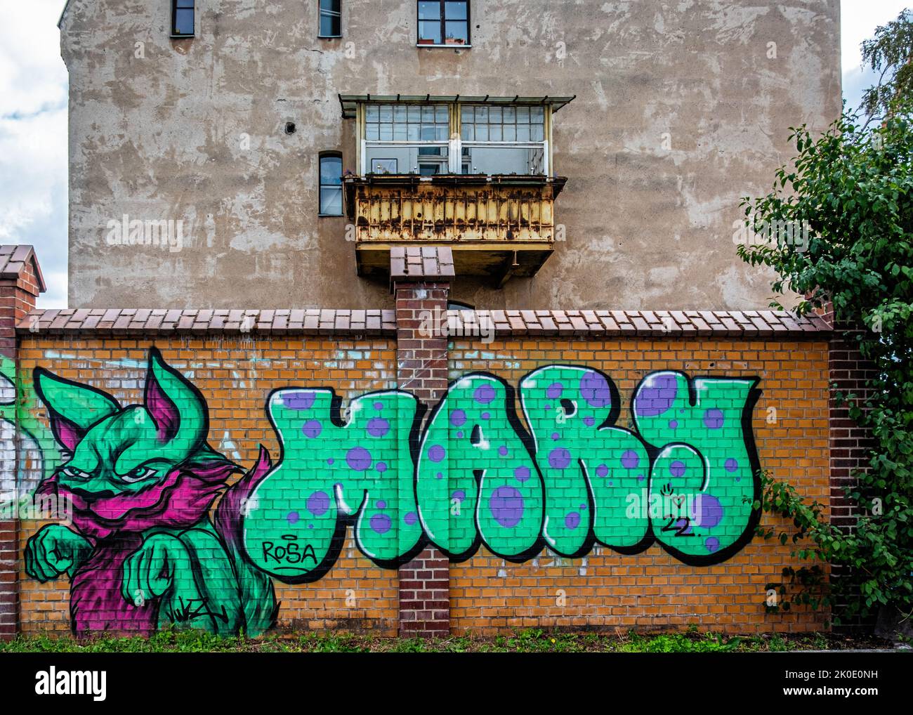 Wall with urban art & balcony on Firewall of building, Ollenhauerstrasse, Reinickendorf, Berlin, Germany Stock Photo