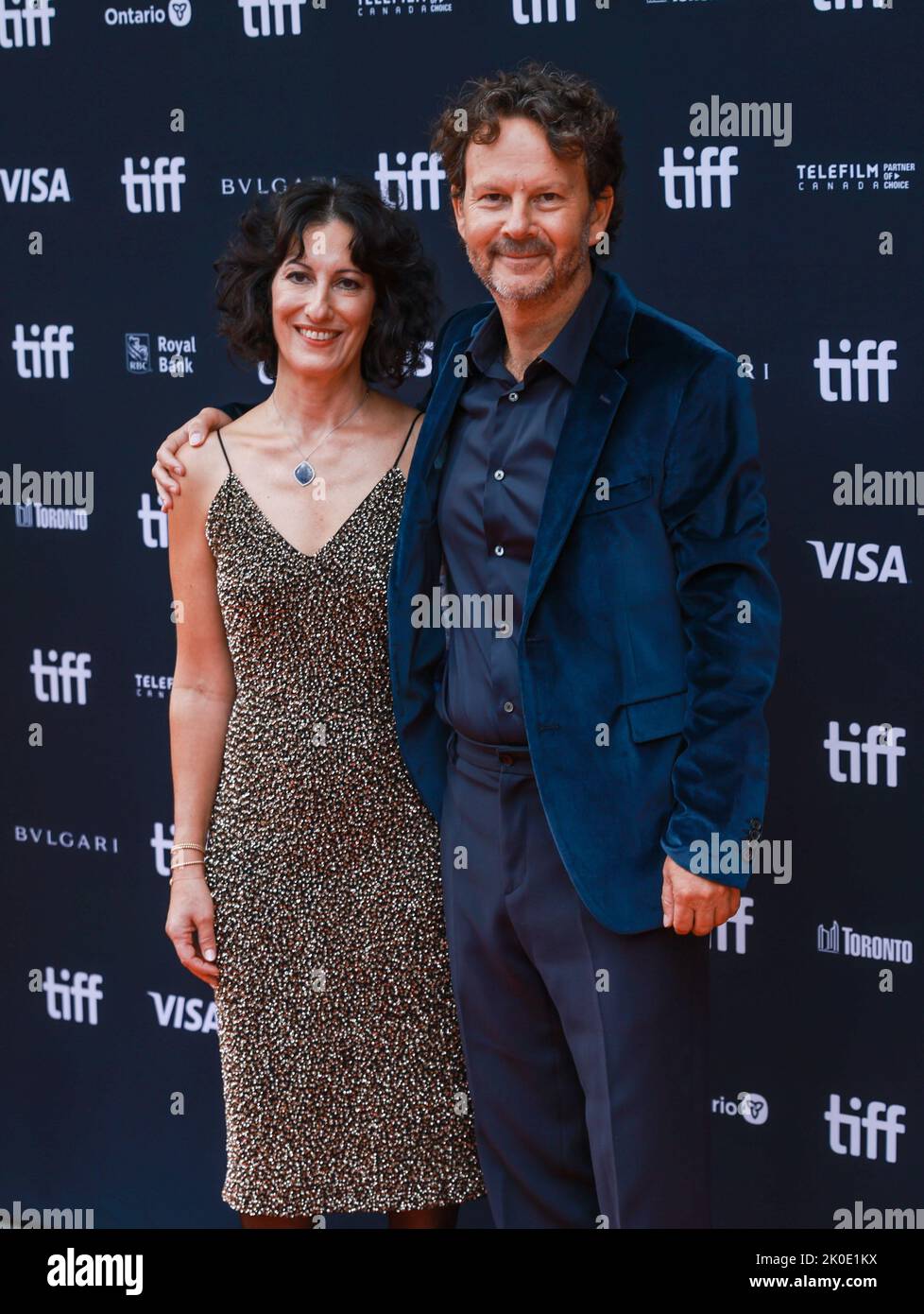 Toronto, Canada. 10th Sep, 2022. (LR) Guest, Ram Bergman, Rian Johnson