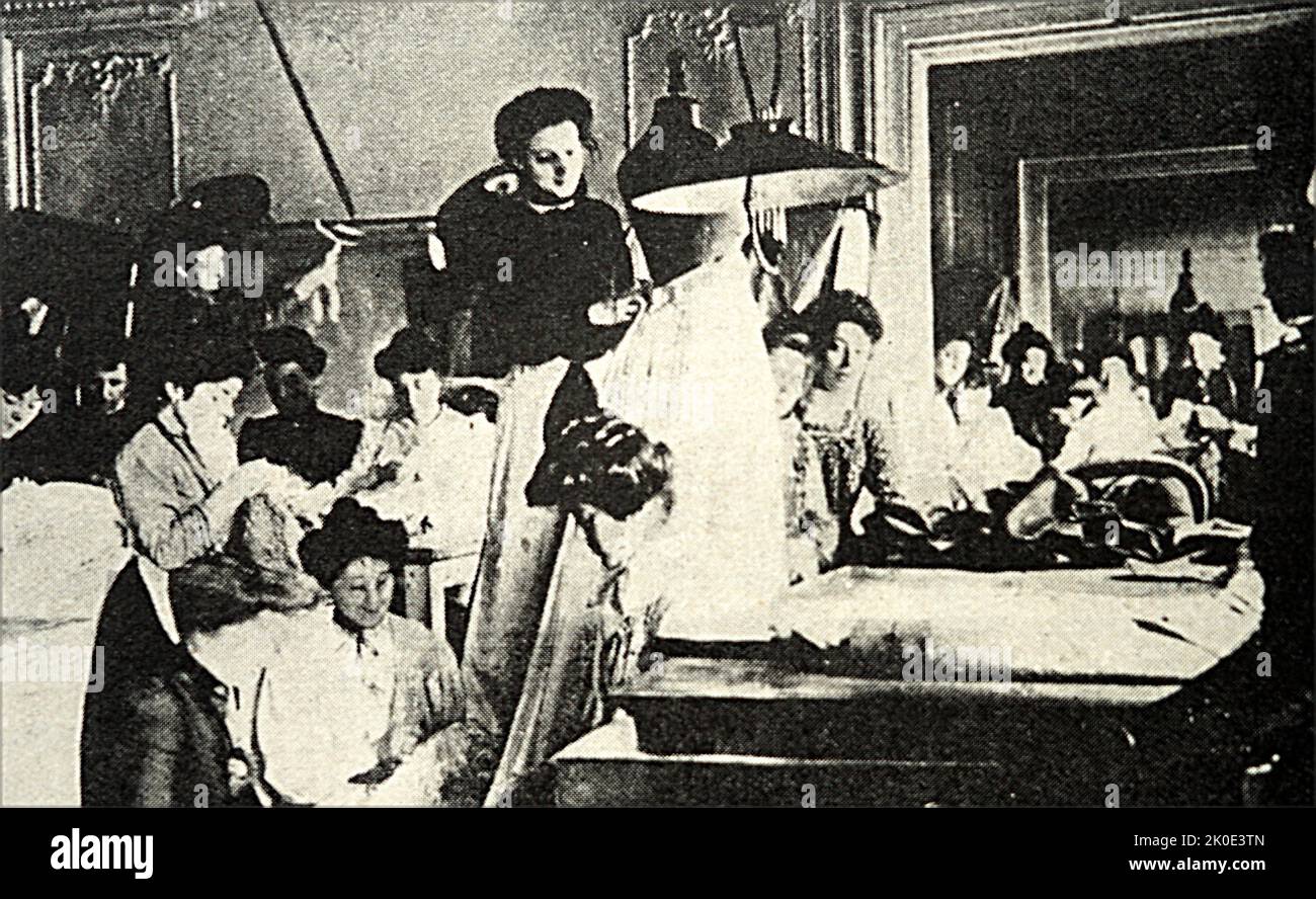 Paris based sweatshop conditions in a clothing factory, 1910. Stock Photo