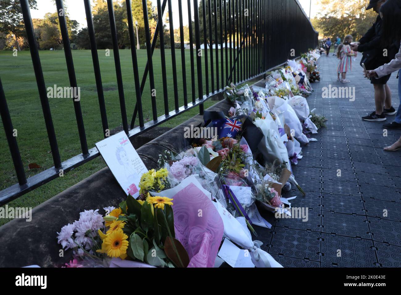 Sydney, Australia. 11th September 2022. Members of the public have been asked to leave flowers outside Government House, the official residence of the monarch’s representative for NSW. A slow trickle of people passed through to place flowers and pay their respects. Credit: Richard Milnes/Alamy Live News Stock Photo