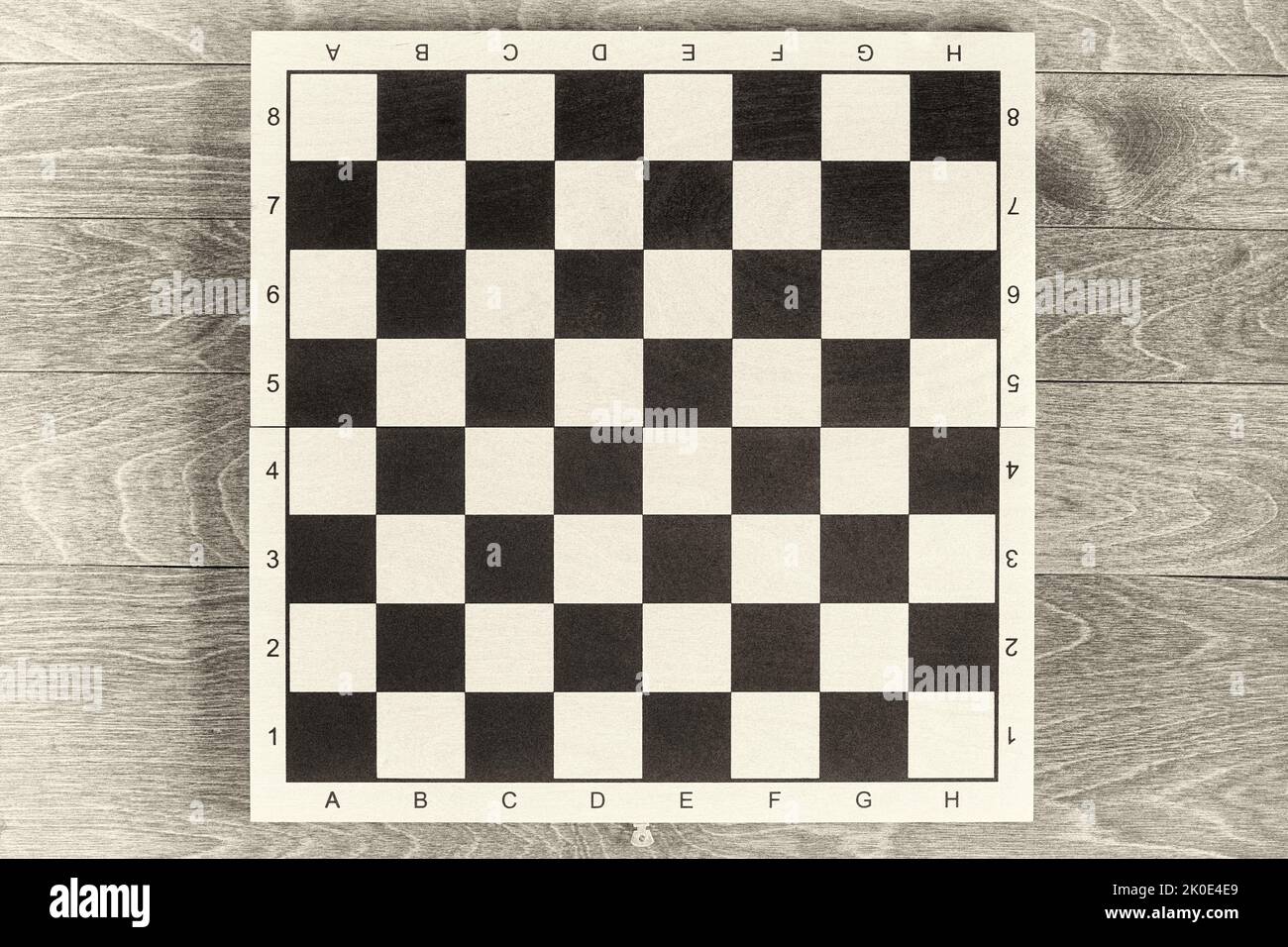 Vintage film image of old classic chessboard as a template. Mockup for education Stock Photo