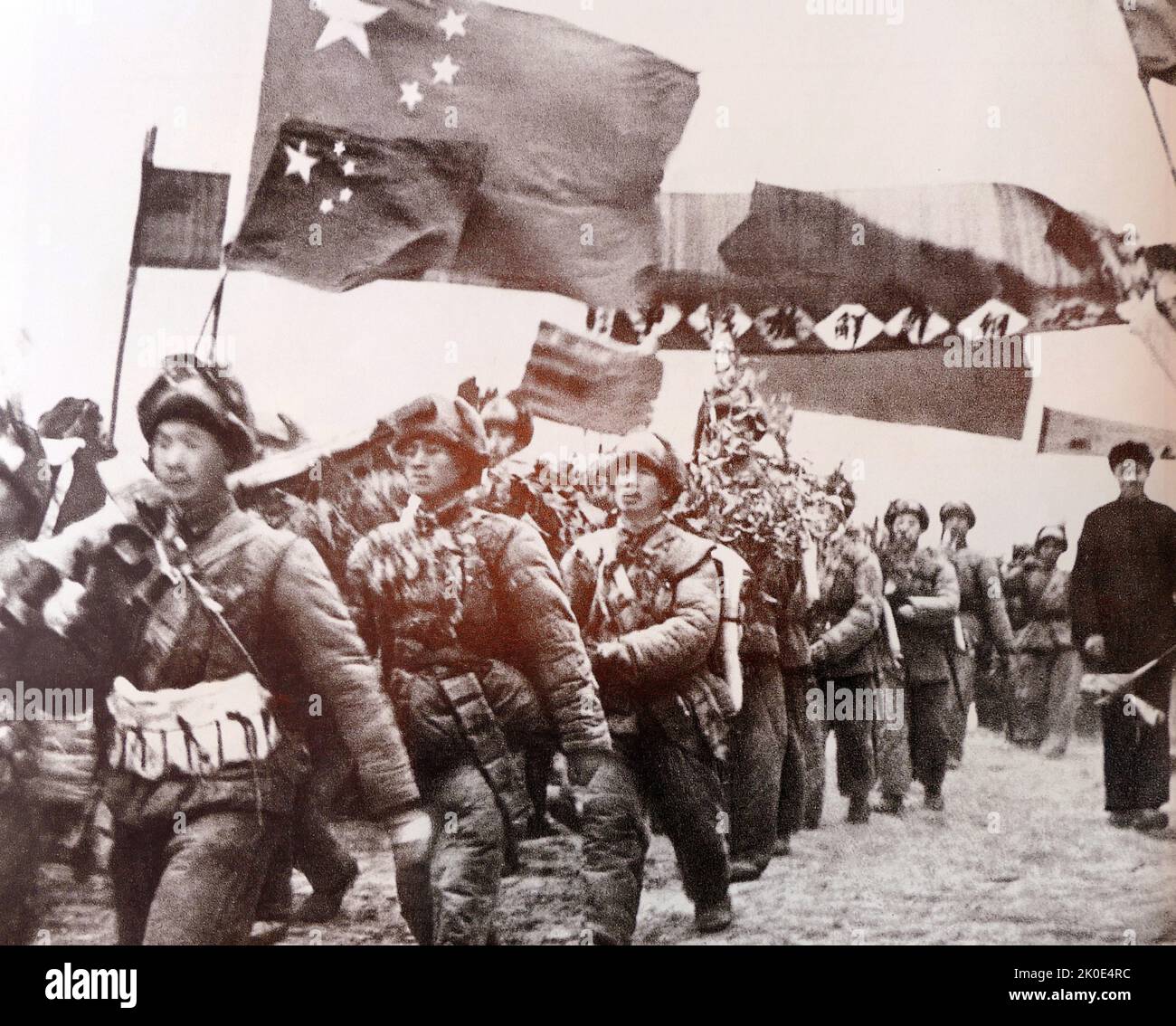 Chinese forces entering the Korean War, between North Korea and South Korea from 25 June 1950 to 27 July 1953. It began as an attempt by North Korean supreme leader Kim Il-sung to unify Korea under his communist regime through military force. Two powers entered the war, with the United States under President Truman fighting alongside the South and the newly established People's Republic of China fighting alongside the North. Stock Photo