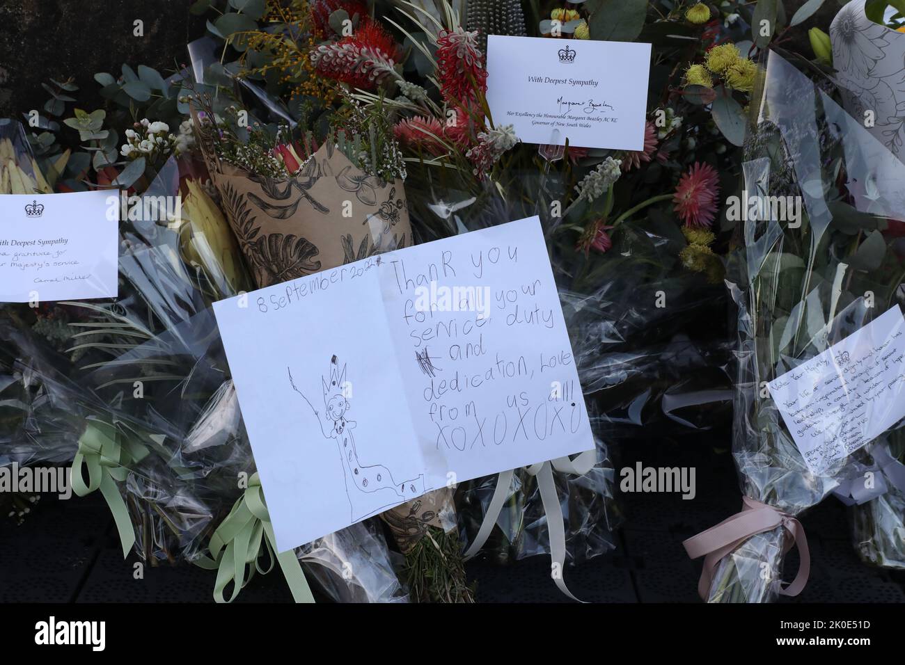 Sydney, Australia. 11th September 2022. Members of the public have been asked to leave flowers outside Government House, the official residence of the monarch’s representative for NSW. A slow trickle of people passed through to place flowers and pay their respects. Credit: Richard Milnes/Alamy Live News Stock Photo