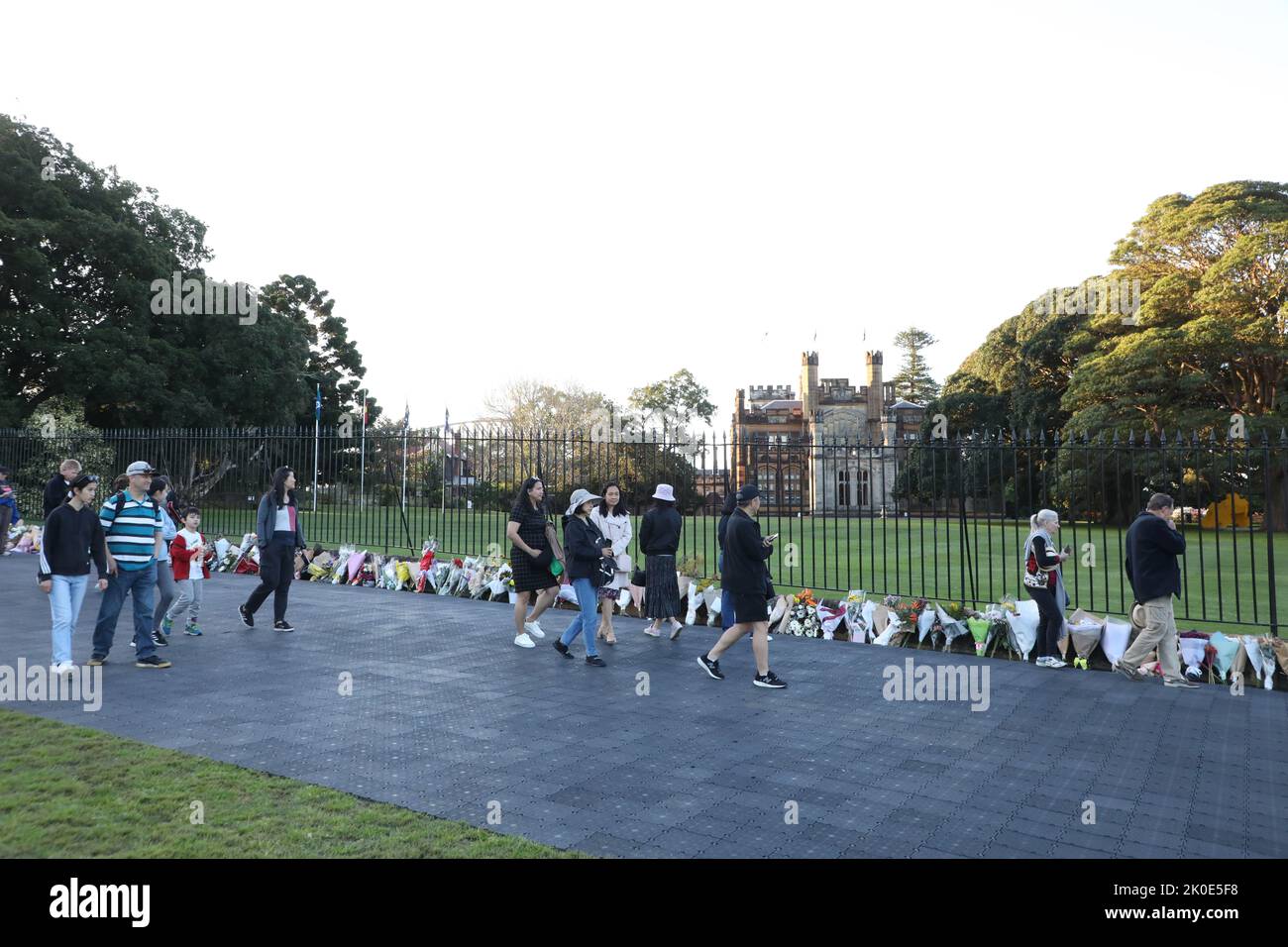 Sydney, Australia. 11th September 2022. Members of the public have been asked to leave flowers outside Government House, the official residence of the monarch’s representative for NSW. A slow trickle of people passed through to place flowers and pay their respects. Credit: Richard Milnes/Alamy Live News Stock Photo