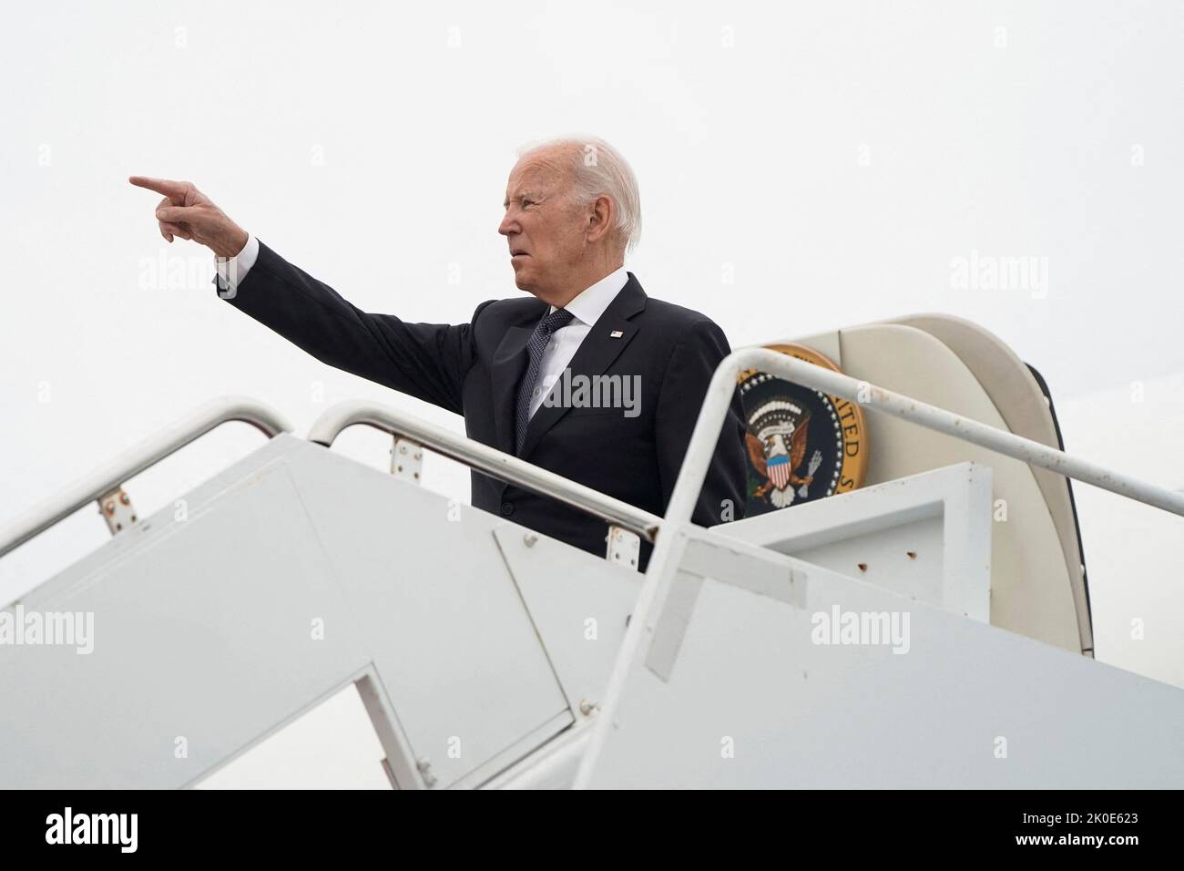 U.S. President Joe Biden points as he boards Air Force One as he departs for Washington from New Castle, Delaware, U.S., September 11, 2022.      REUTERS/Joshua Roberts Stock Photo