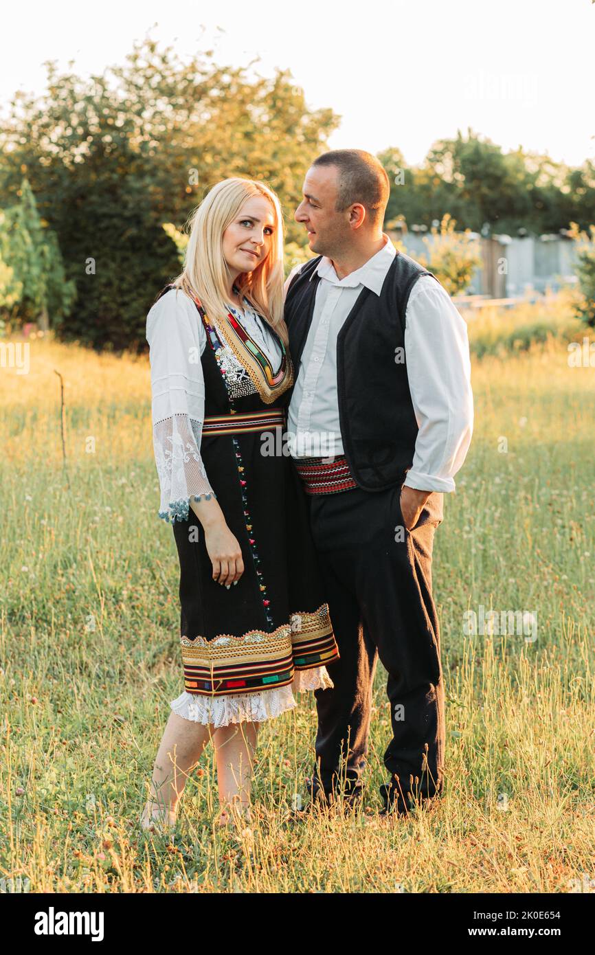 Husband and wife in Serbian traditional clothing. Stock Photo