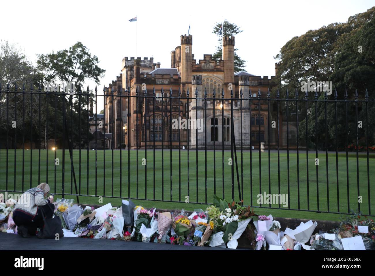 Sydney, Australia. 11th September 2022. Members of the public have been asked to leave flowers outside Government House, the official residence of the monarch’s representative for NSW. A slow trickle of people passed through to place flowers and pay their respects. Credit: Richard Milnes/Alamy Live News Stock Photo