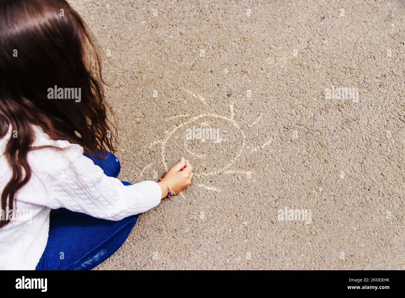 Children draw on the pavement with chalk. Selective focus. nature Stock ...