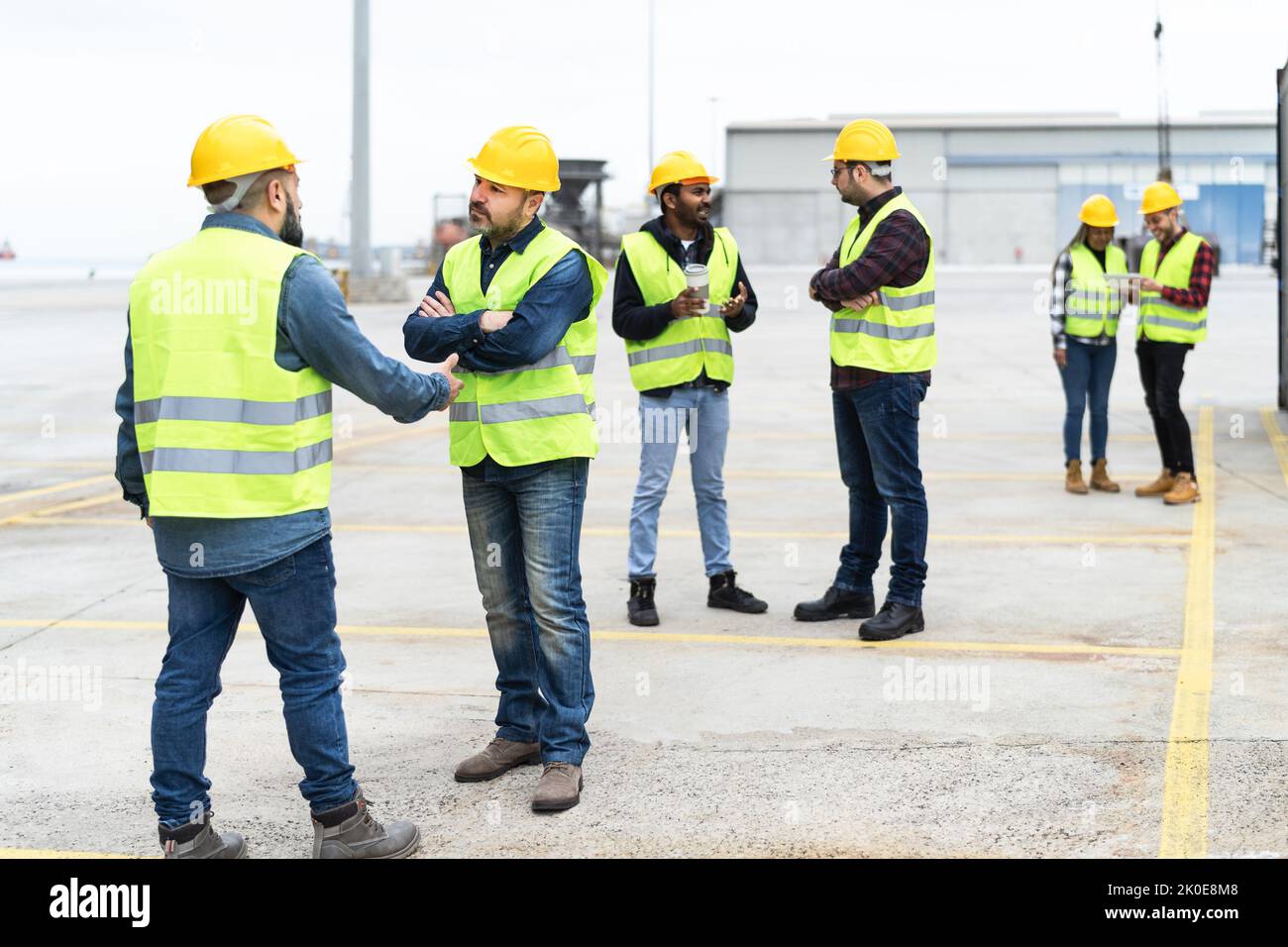 Industrial engineers working in logistic terminal of container cargo Stock Photo