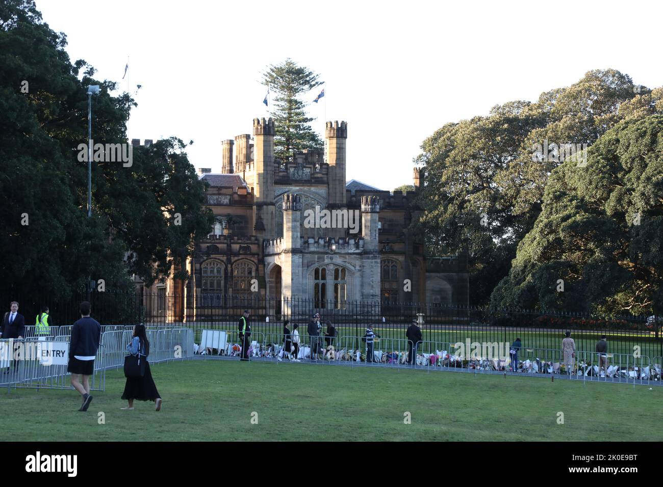 Sydney, Australia. 11th September 2022. Members of the public have been asked to leave flowers outside Government House, the official residence of the monarch’s representative for NSW. A slow trickle of people passed through to place flowers and pay their respects. Credit: Richard Milnes/Alamy Live News Stock Photo