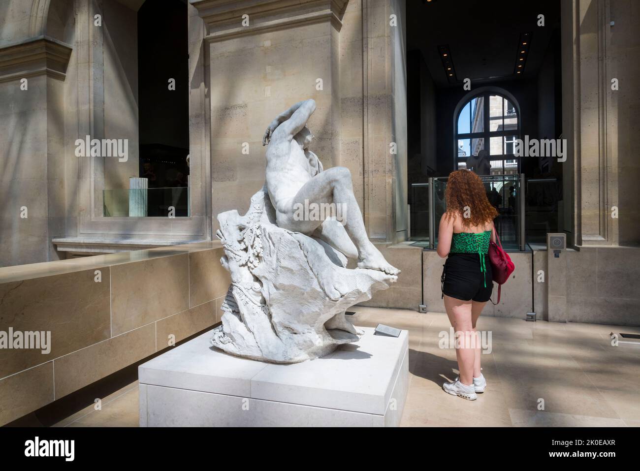 Sleeping Faun sculpture, marble, 1730, The Cour Puget where French sculpture is exhibited, Louvre Museum, the world's most-visited museum, and a histo Stock Photo
