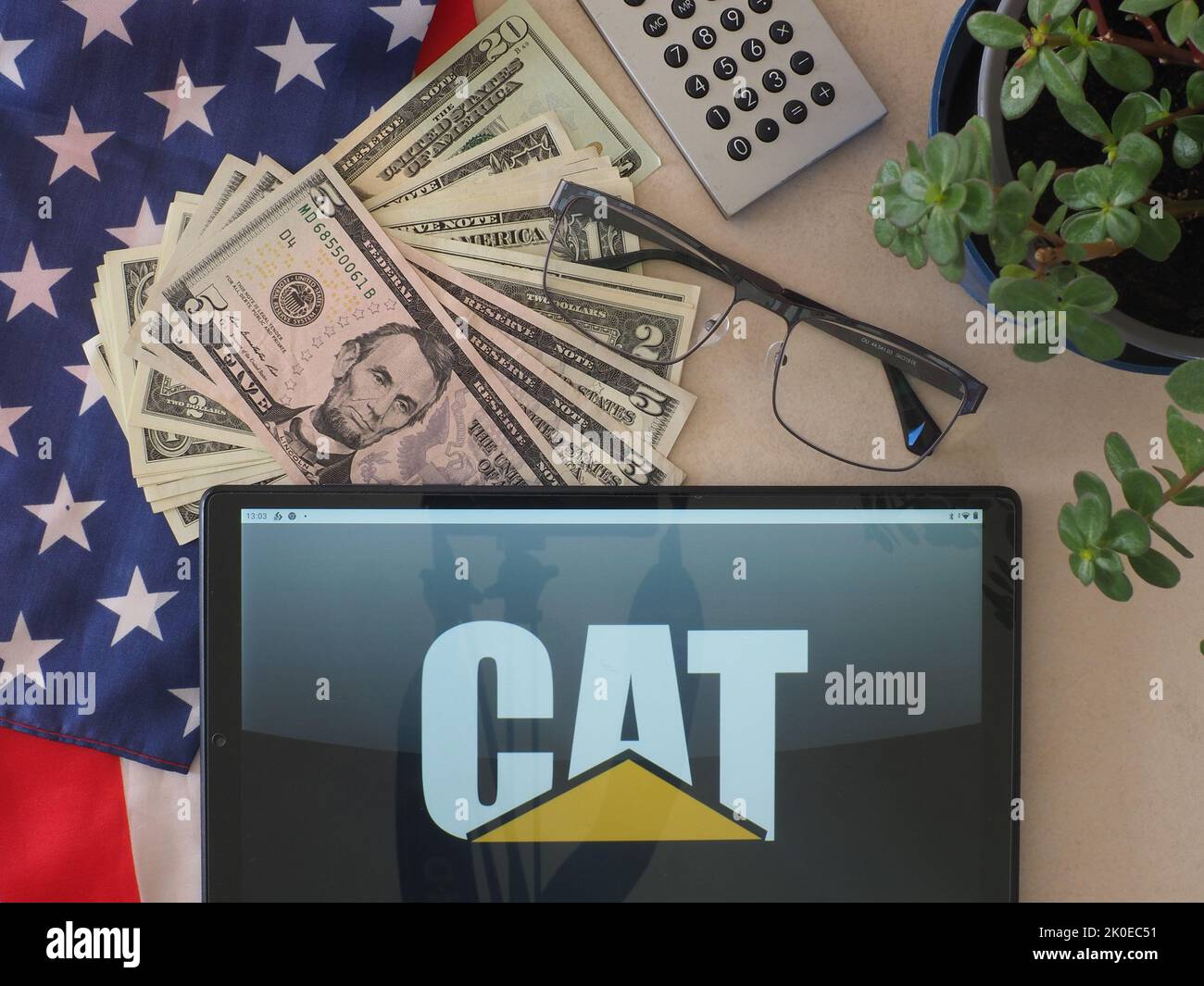 In this photo illustration, Caterpillar Inc. logo seen displayed on a tablet Stock Photo