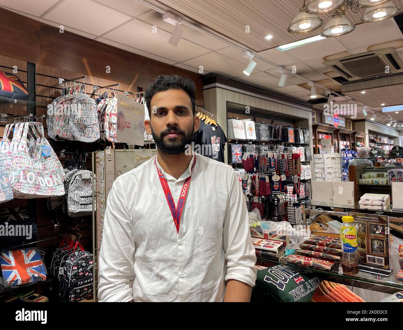 Ismail Ibrahim, 27, manager of Cool Britannia souvenir shop near Buckingham Palace who has said the number of customers buying memorabilia doubled overnight following the death of Queen Elizabeth II on Thursday. Picture date: Sunday September 11, 2022. Stock Photo