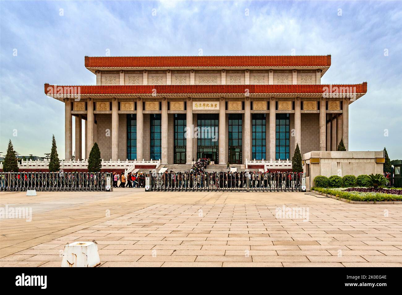 A long queue waits patiently to enter the stately Chairman Mao Memorial Hall, the final resting place of Mao Zedong embalmed in a crystal coffin Stock Photo