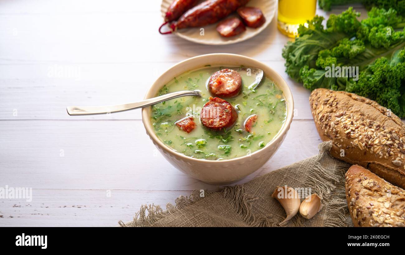 Portuguese Cabbage soup called Caldo Verde on white table Stock Photo