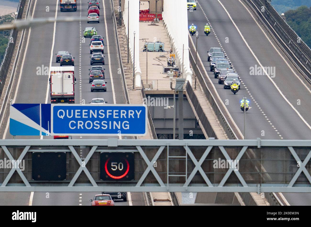 South Queensferry, Scotland, UK. 11th September 2022. Queen Elizabeth II coffin cortège drives across Queensferry Crossing Bridge at South Queensferry. The Queen opened this bridge almost 5 years to the day on 4 September 2017. Iain Masterton/Alamy Live News Stock Photo