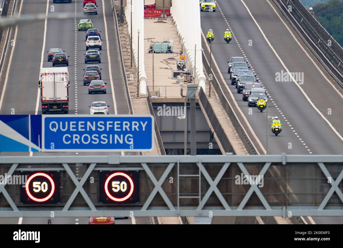 South Queensferry, Scotland, UK. 11th September 2022. Queen Elizabeth II coffin cortège drives across Queensferry Crossing Bridge at South Queensferry. The Queen opened this bridge almost 5 years to the day on 4 September 2017. Iain Masterton/Alamy Live News Stock Photo