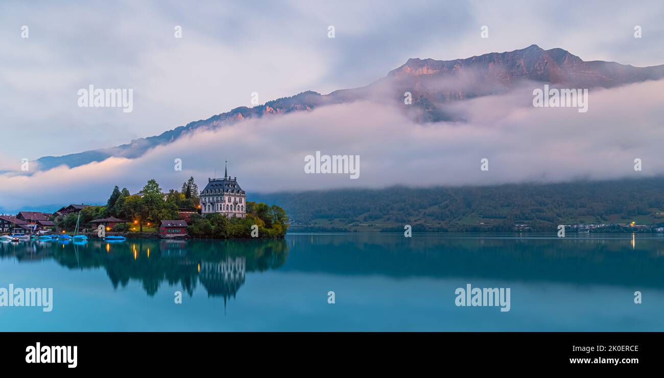 A beautiful early summer morning in Iseltwald, one of Switzerland's gems. Located on Lake Brienz southern shores, it is like a fairy-tale village surr Stock Photo