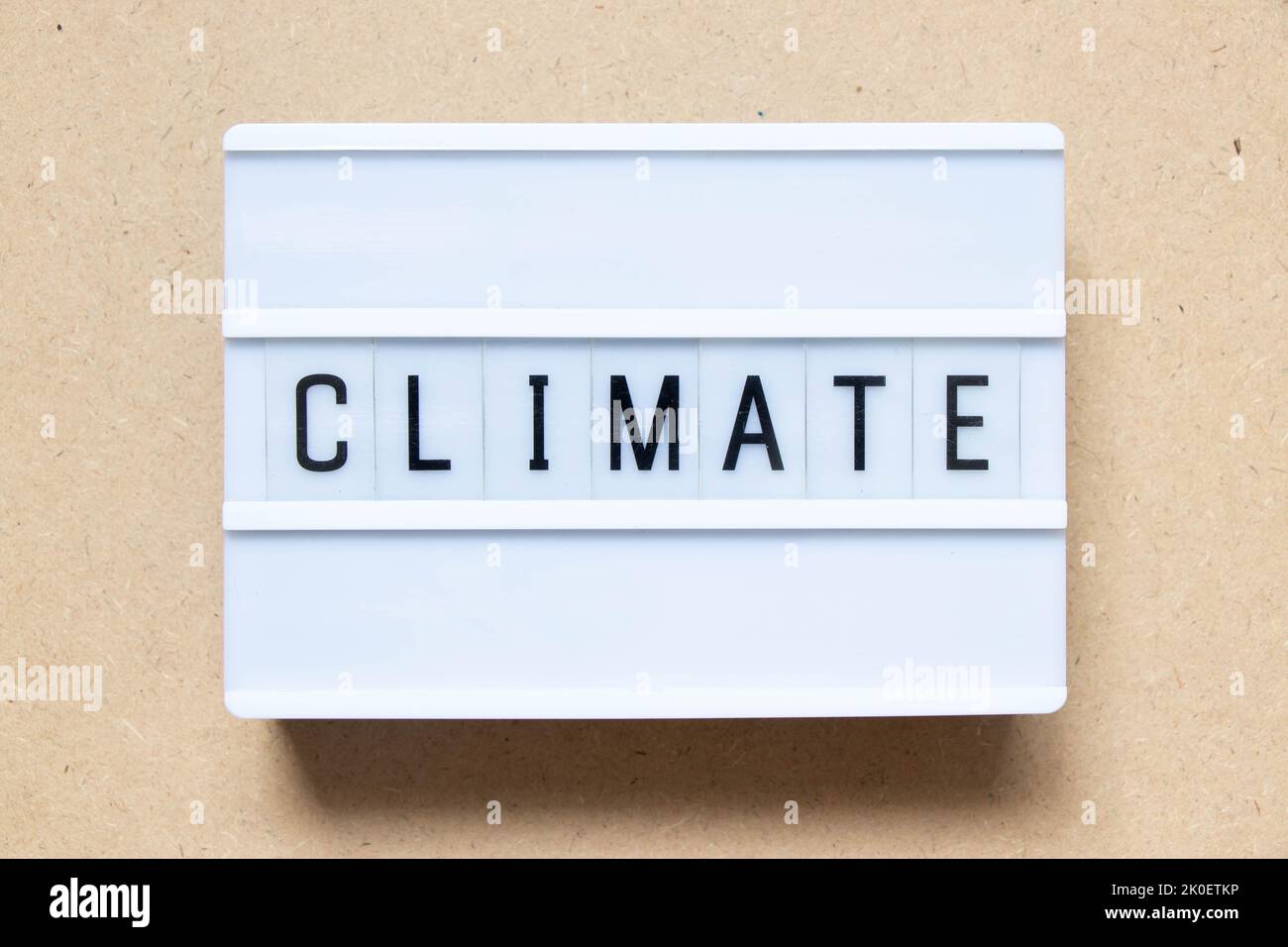 Lightbox with word climate on wood background Stock Photo