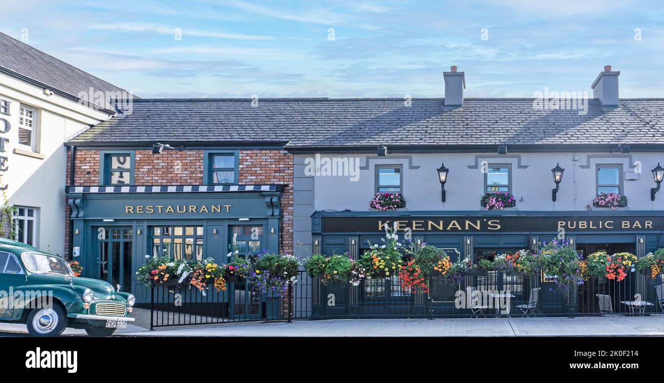 The beautiful floral display outside Keenan’s Hotel, Bar and Restaurant in Tarmonbarry, County Roscommon, Ireland. Stock Photo
