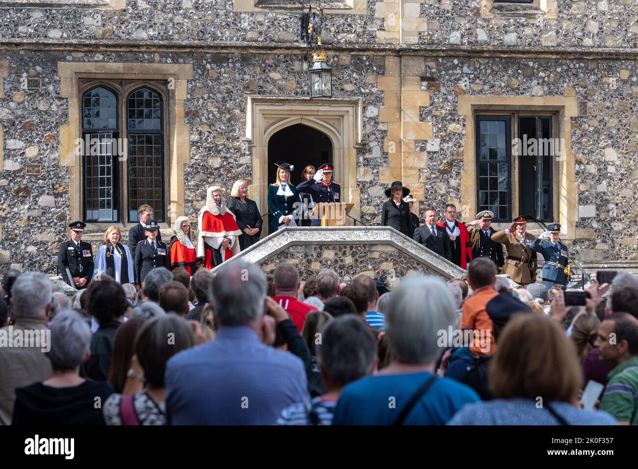 Winchester, Hampshire, UK. 11th September, 2022. The Proclamation of the Accession of King Charles III three days after the death of Queen Elizabeth II. The High Sheriff of Hampshire, Lady Edwina Grosvenor, accompanied by the Lord Lieutenant of Hampshire and other dignitaries, read the proclamation at 1pm outside The Great Hall in front of crowds of people. Stock Photo