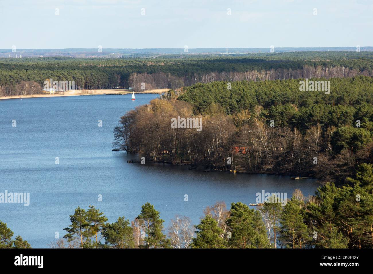 Konotop, Poland. 16th Apr, 2022. Landscape of the Slawskie Lake District seen from the 'Joanna' viewing platform in Konotop village, Lubusz Voivodeship. Slawskie Lake surrounded by pine forests is the largest reservoir in the Lubuskie Province. Captivating views make the Slawskie Lake area a popular tourist destination. (Photo by Karol Serewis/SOPA Images/Sipa USA) Credit: Sipa USA/Alamy Live News Stock Photo