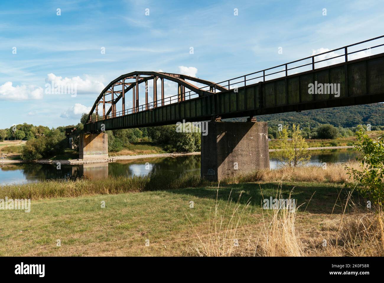 Abandoned railway bridge from 1938 across the Weser river  in Porta Westfalica Stock Photo