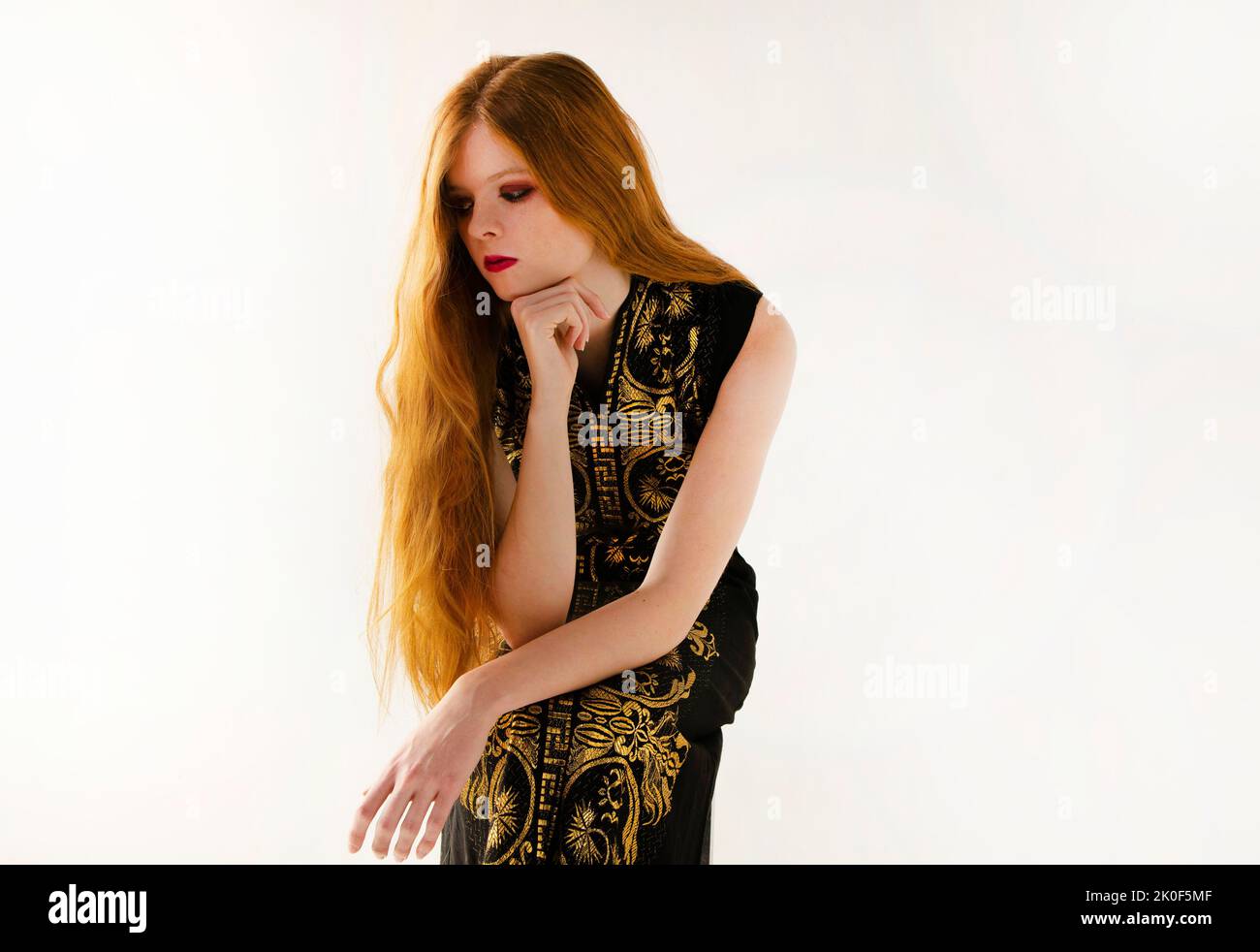 Woman wearing gold lipstick hi-res stock photography and images - Alamy