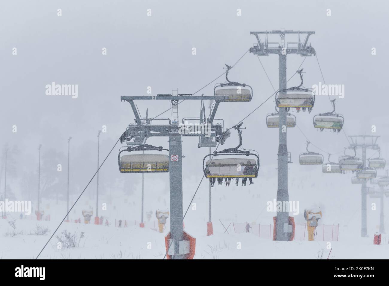 The cable car in the ski resort in the snowfall. Stock Photo
