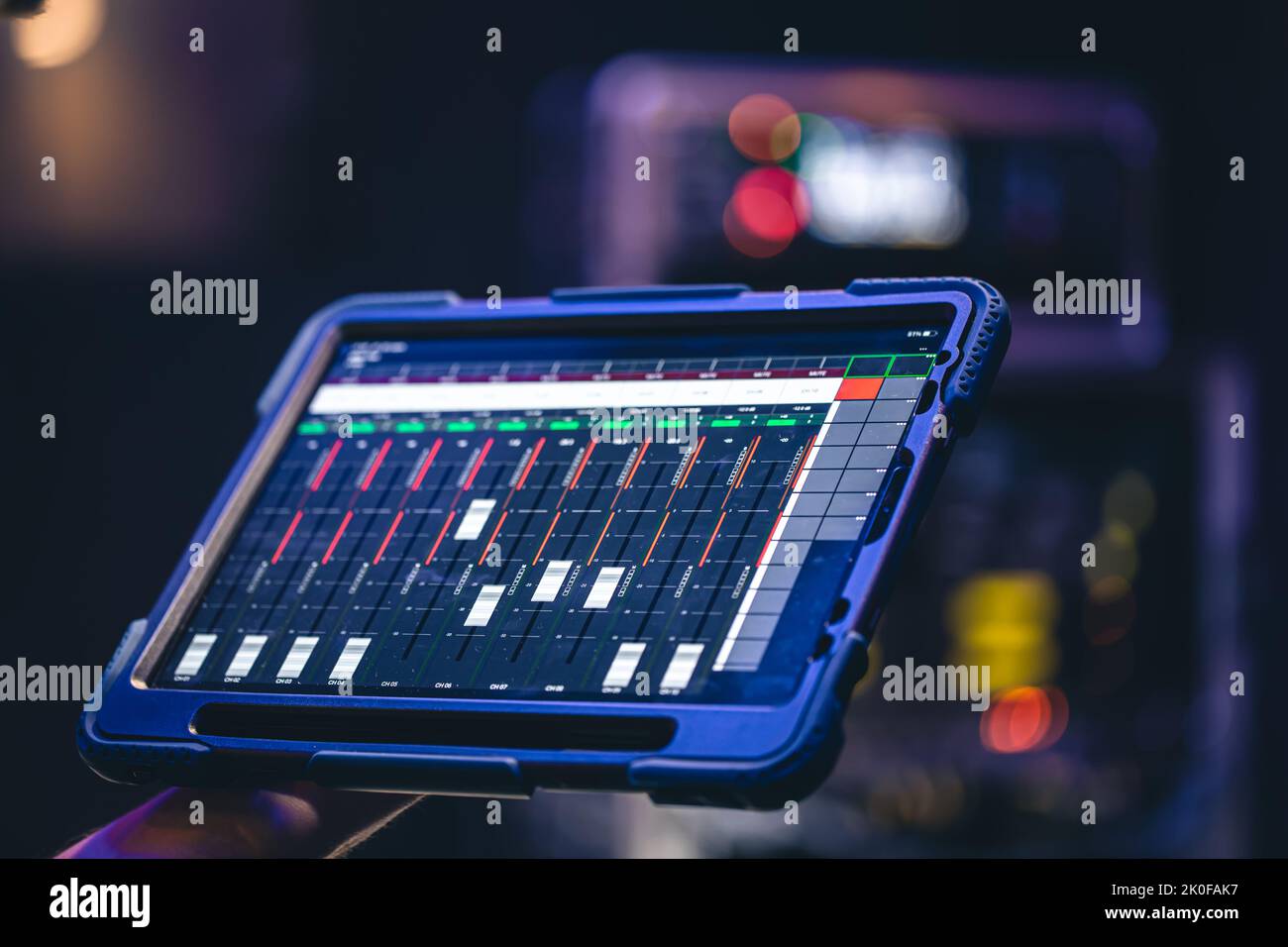 Remote control and sound settings from the tablet. Stock Photo