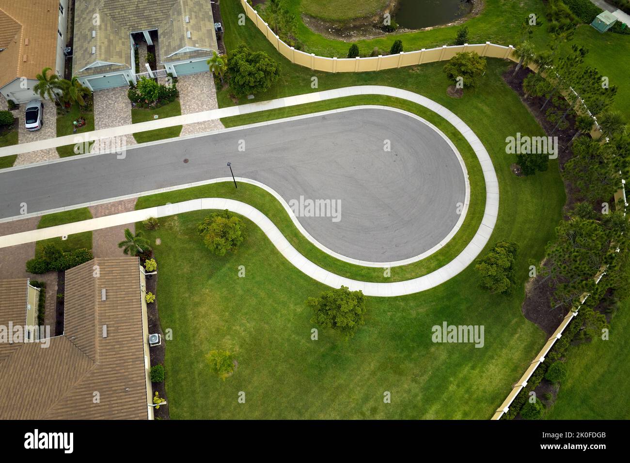 Aerial view of culdesac at neighborhood street dead end with tightly