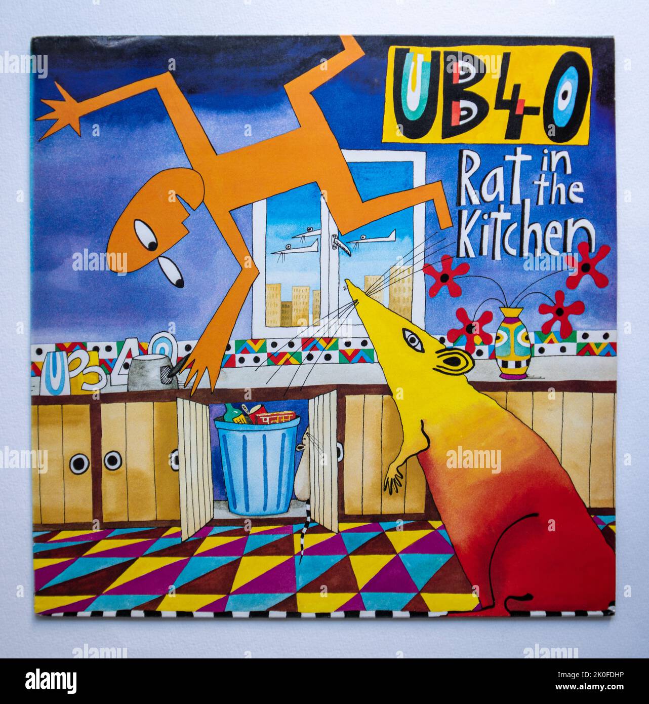 LP cover of Rat in the Kitchen, the seventh album by British reggae band UB40, which was released in 1986 Stock Photo