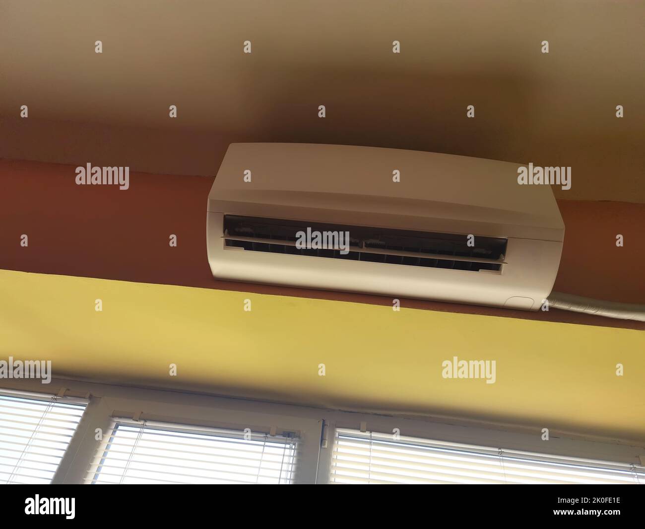 Air conditioner indoor unit mounted on office wall Stock Photo Alamy