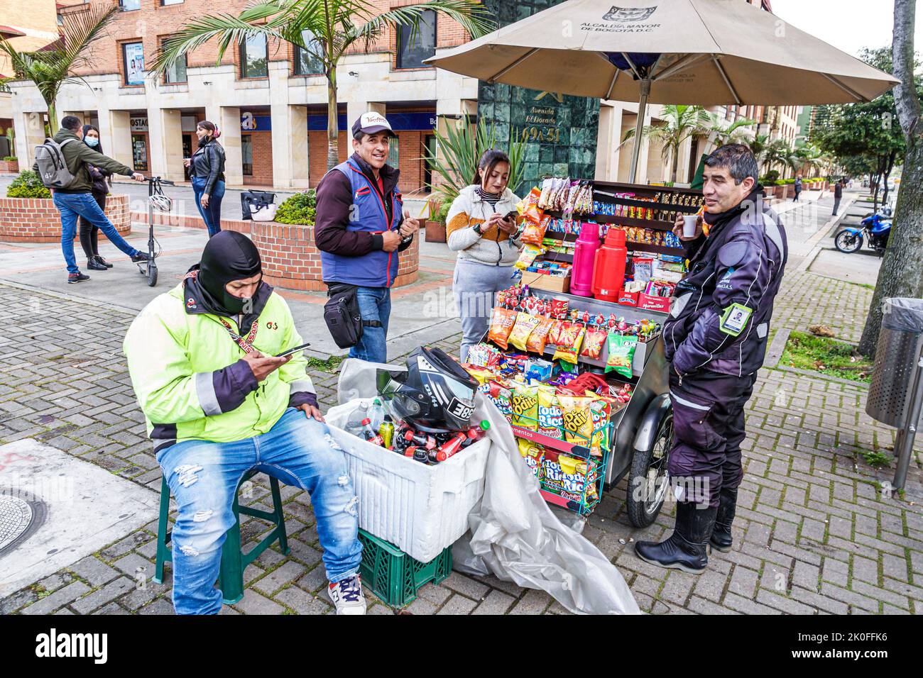 Bogota Colombia,Avenida El Dorado Calle 26,street sidewalk vendor vendors cart,man men male woman women female,Colombian Colombians Hispanic Hispanics Stock Photo
