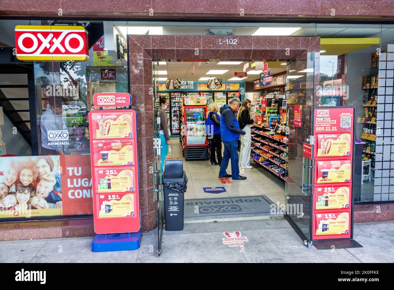 Bogota Colombia,Avenida El Dorado Calle 26,store stores business businesses shop shops market markets marketplace selling buying shopping,Oxxo Mexican Stock Photo