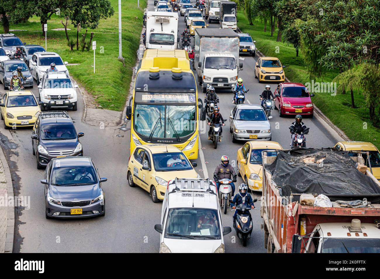 Bogota Colombia,Avenida El Dorado Calle 26,bottleneck merging traffic rush hour cars trucks lorries vehicles,Colombian Colombians Hispanic Hispanics S Stock Photo