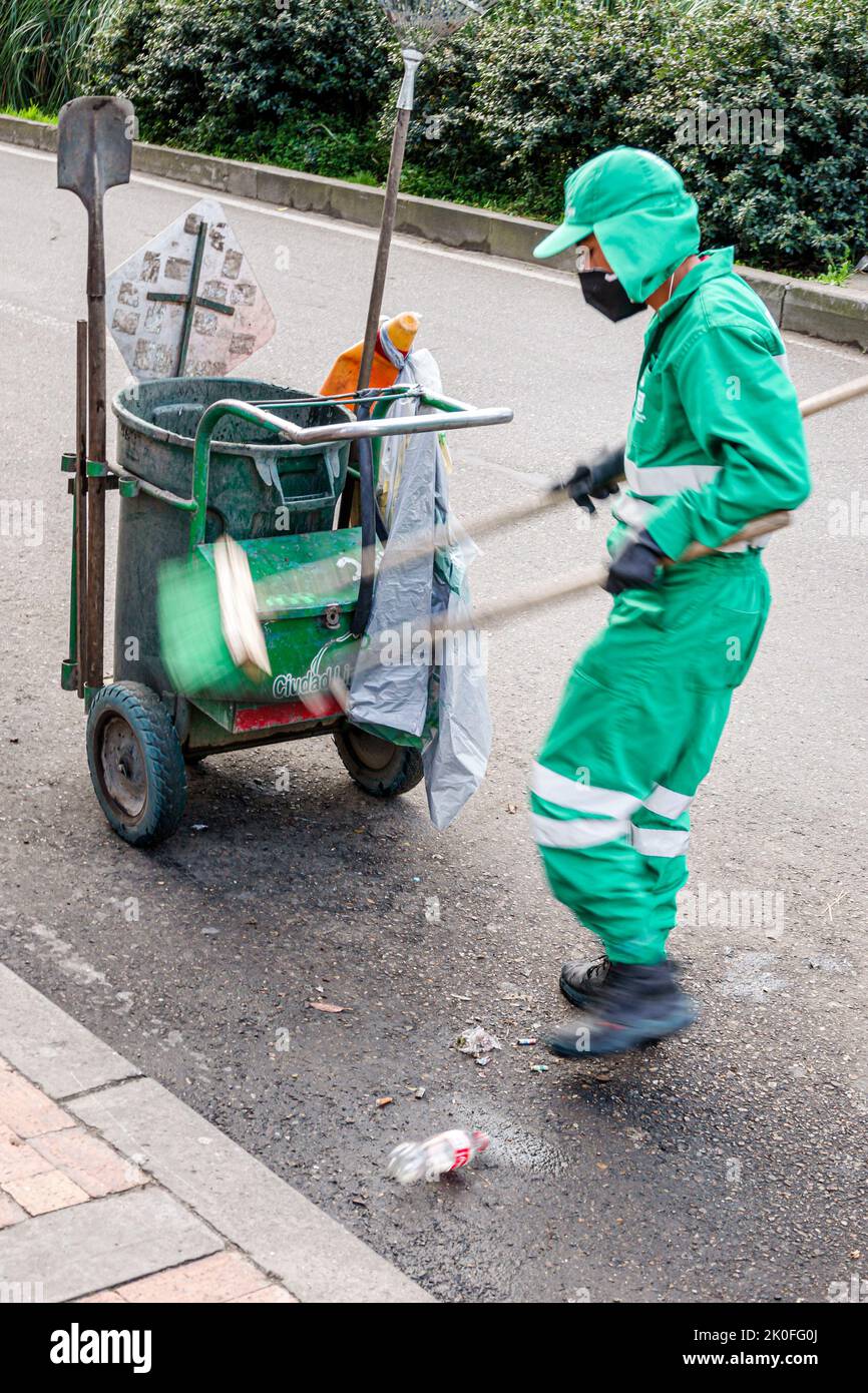 Bogota Colombia,Avenida El Dorado Calle 26,road street sweeper trash bin cart,Colombian Colombians Hispanic Hispanics South America Latin American Ame Stock Photo