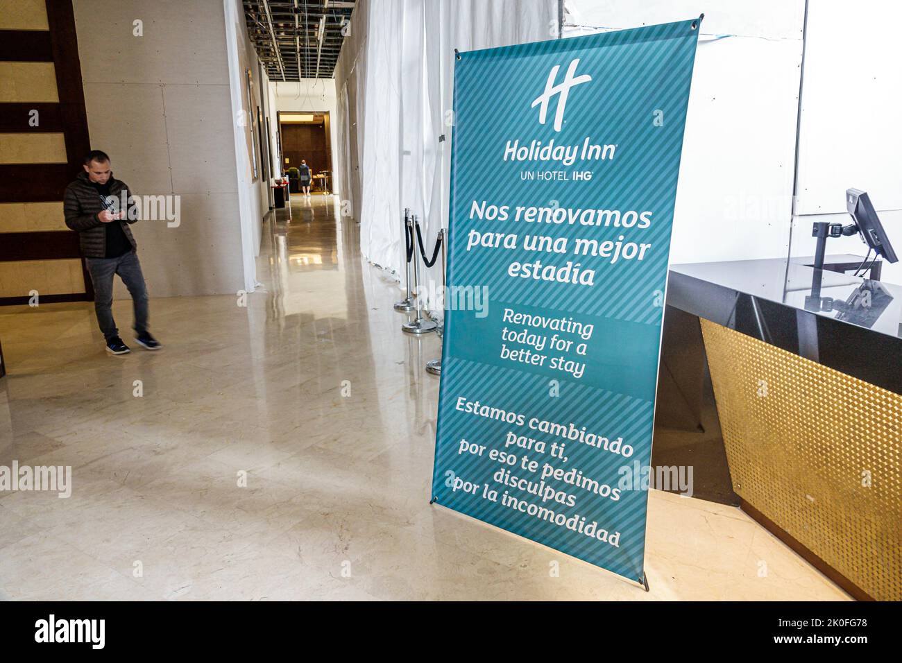 Bogota Colombia,Avenida El Dorado Calle 26,Holiday Inn Bogota Airport IHG hotel poster bilingual English Spanish renovation excuse inconvenience lobby Stock Photo