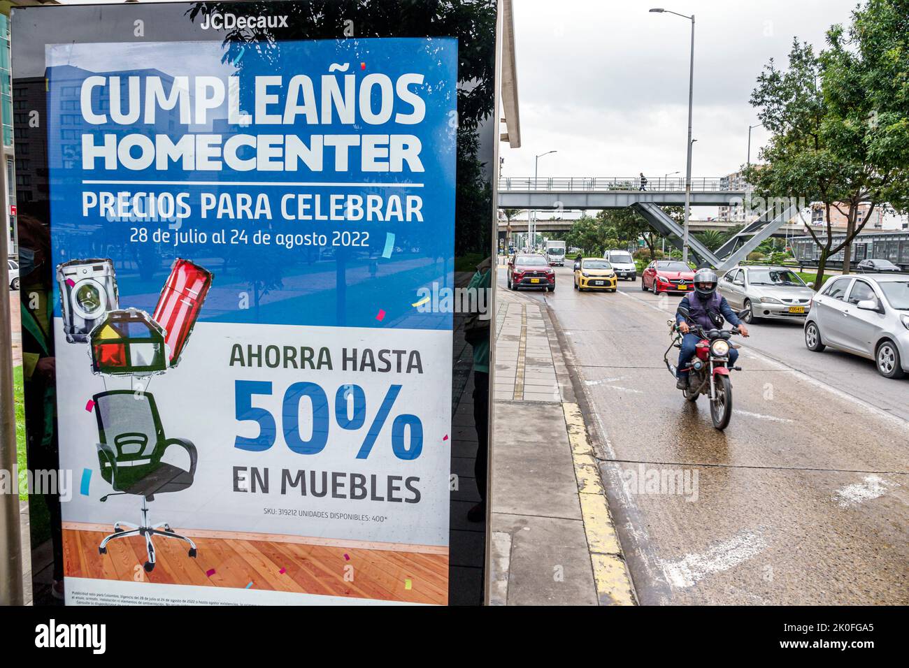 Bogota Colombia,Avenida El Dorado Calle 26,bus-stop advertising billboard sign Homecenter furniture store anniversary sale discount savings 50% traffi Stock Photo