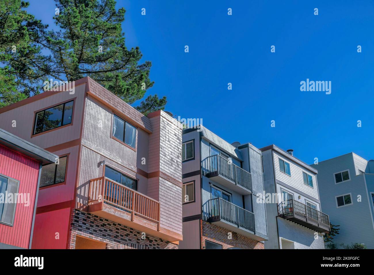 Houses on a sunny day in San Francisco residential area against blue ...