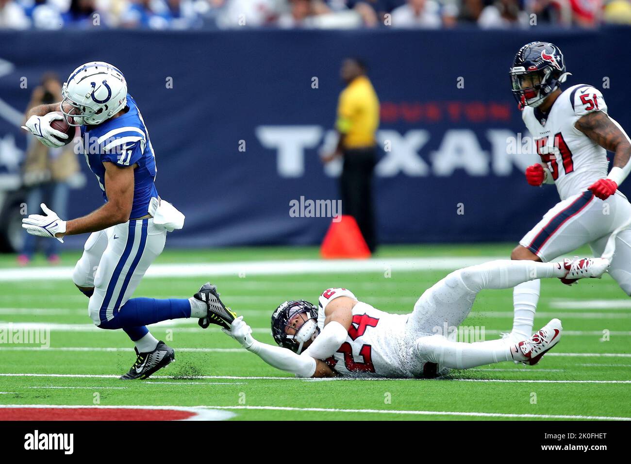 Houston, Texas, USA. Houston, Texas, USA. Houston, Texas, USA. 5th Dec,  2021. Houston Texans safety JUSTIN REID (20) tackles Indianapolis Colts  wide receiver MICHAEL PITTMAN JR. (11) during an NFL game between